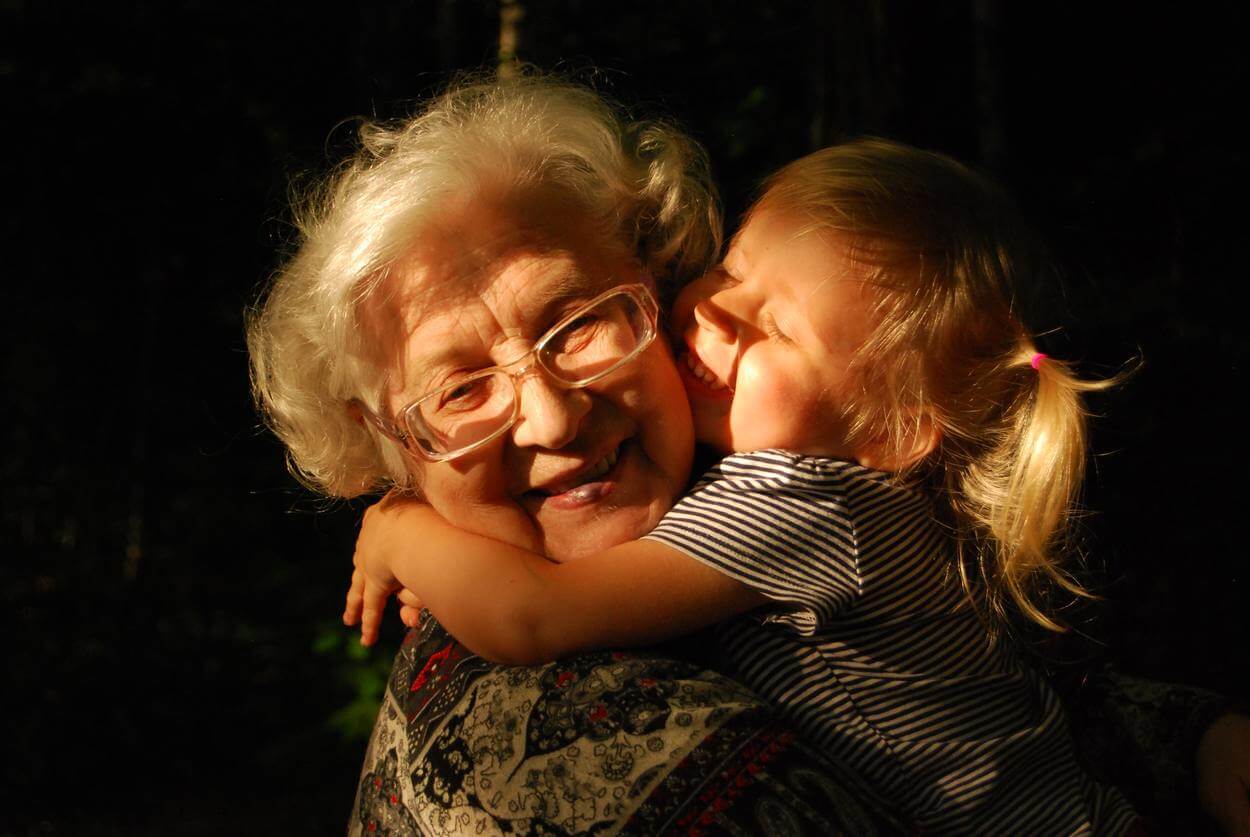 A grandmother with her grand-daughter.