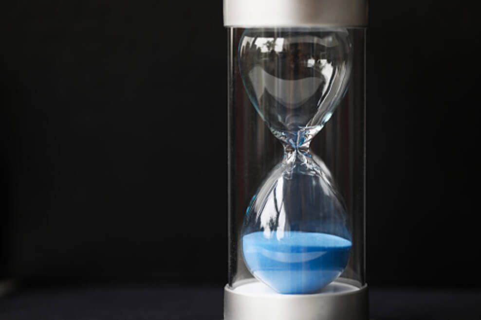 The concept of time is represented through hourglasses. It tells us about past and presents tense