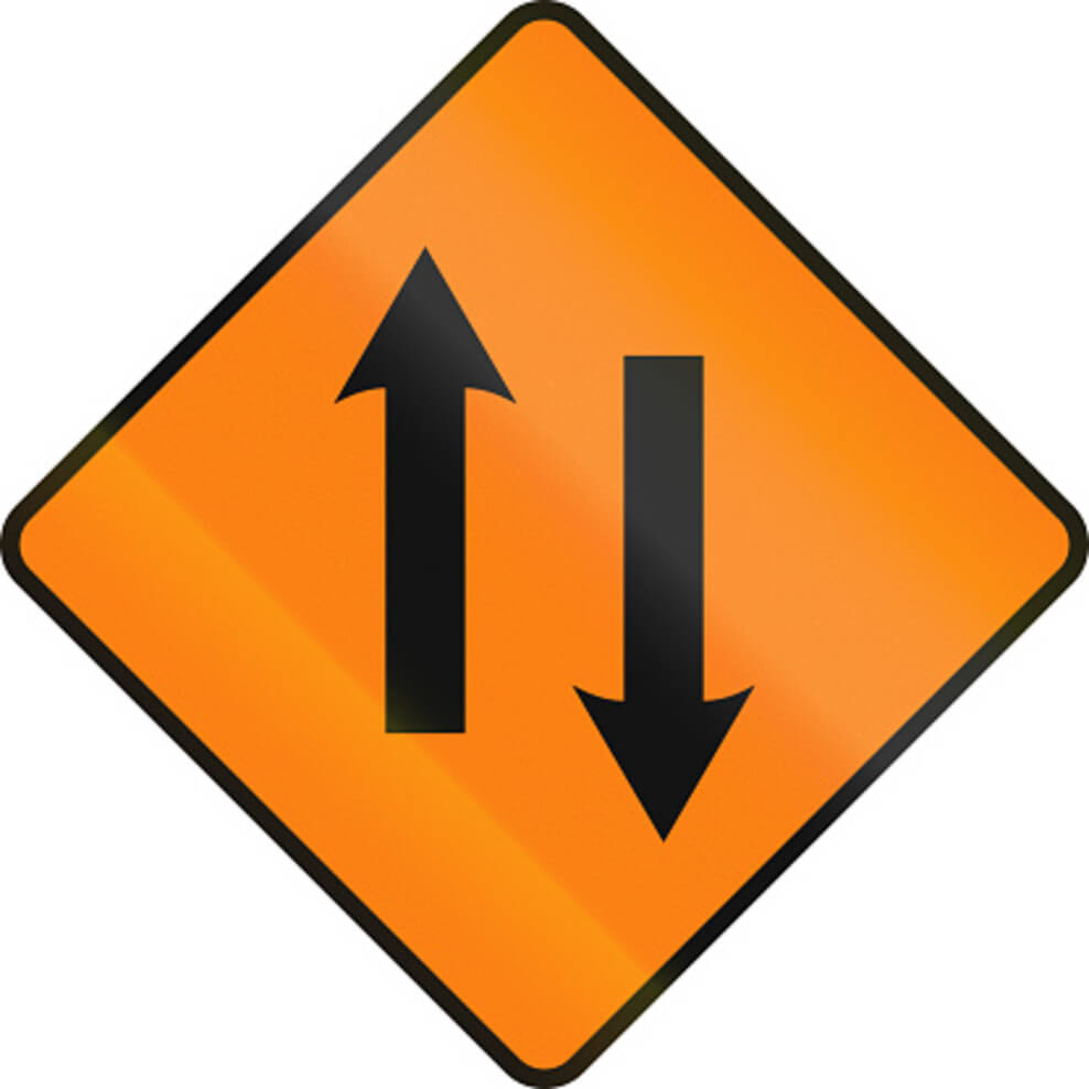 An image showing a two-way road sign