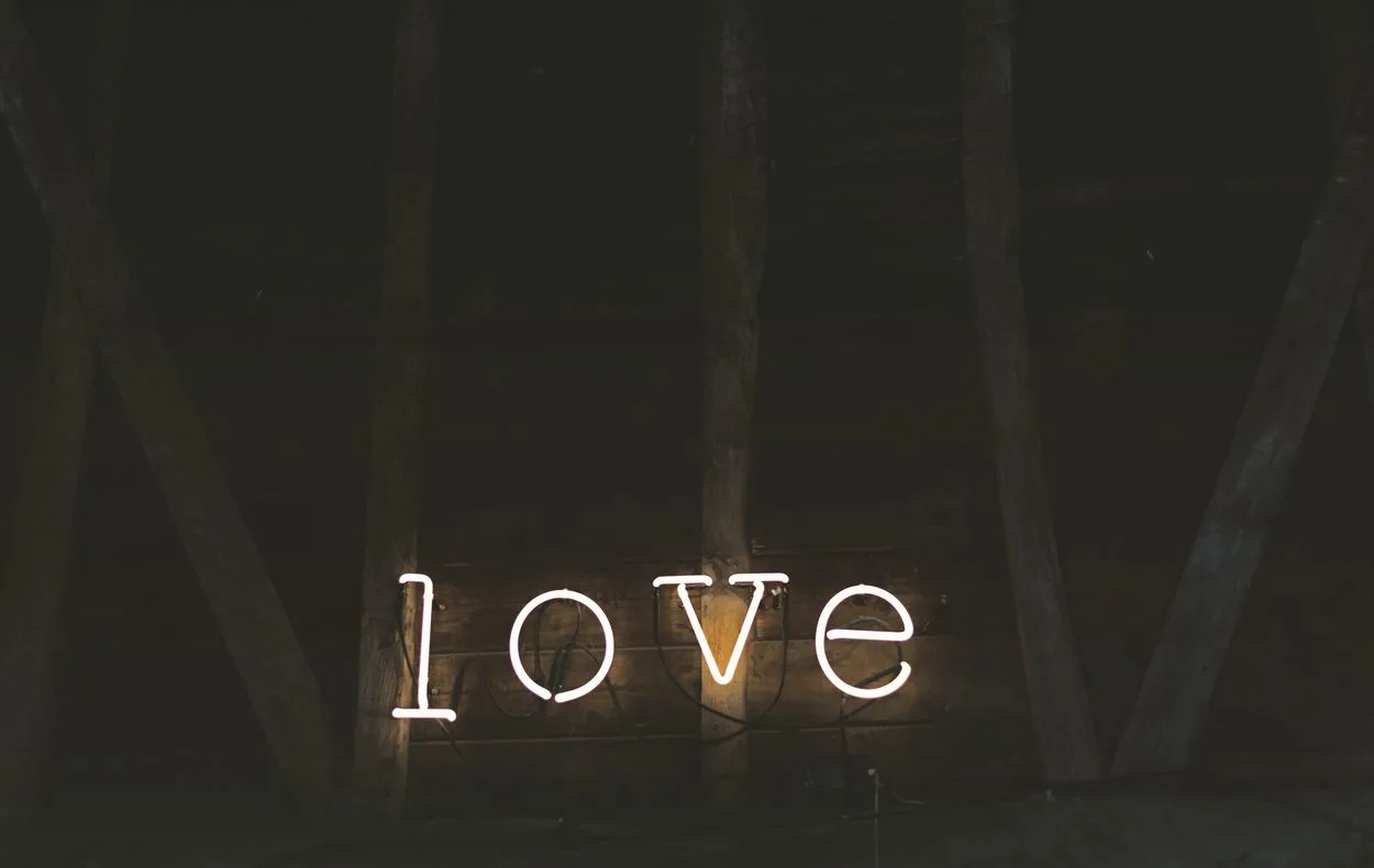 the word love in neon lights