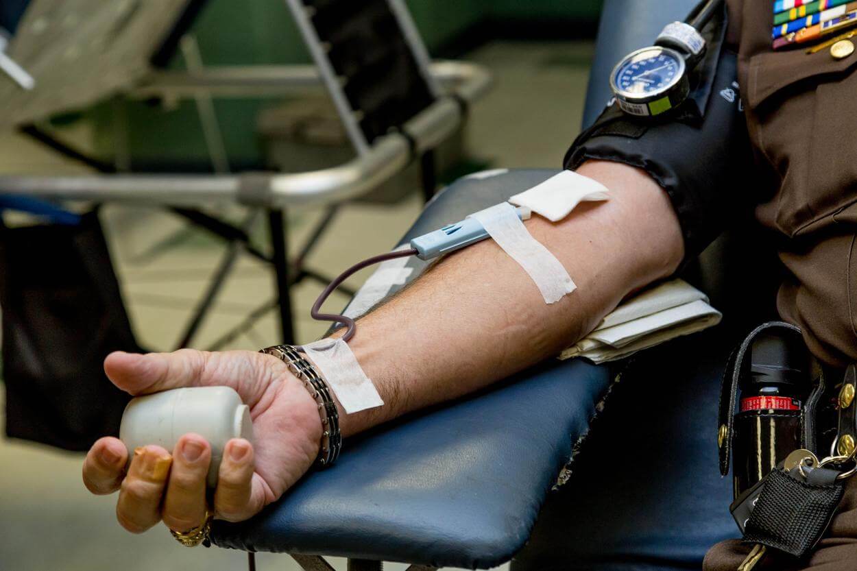 A person donating blood. 