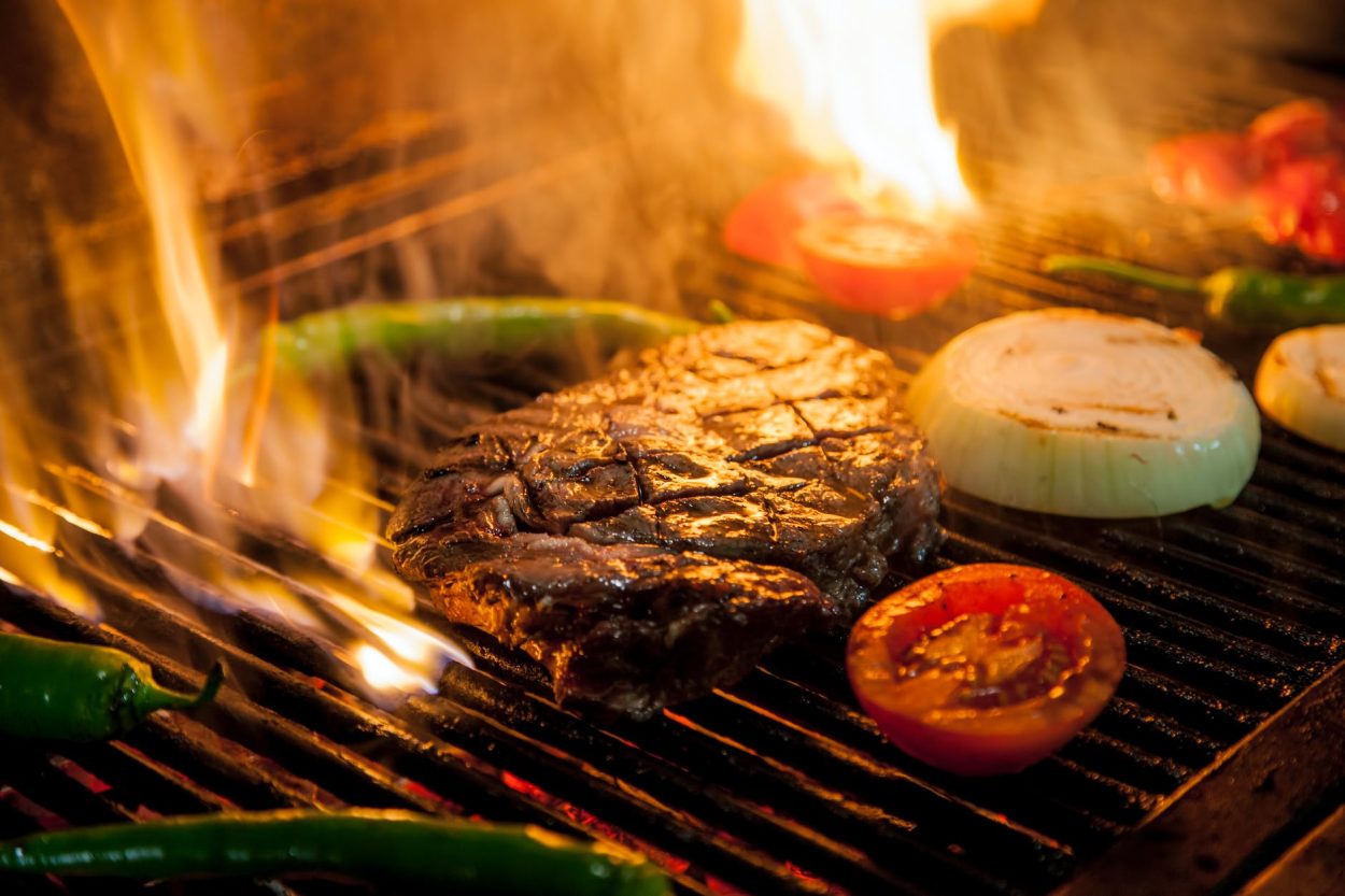High-power electric grill with steak and veggies
