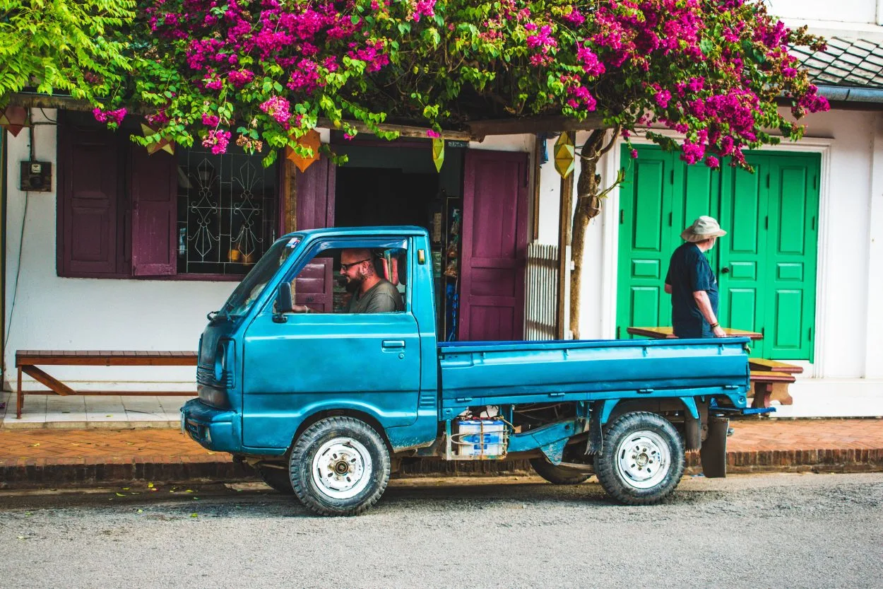 A person in a blue truck