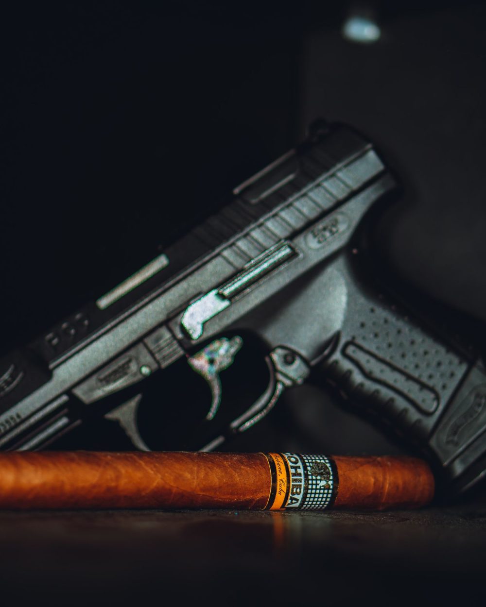 A gun next to a tobacco