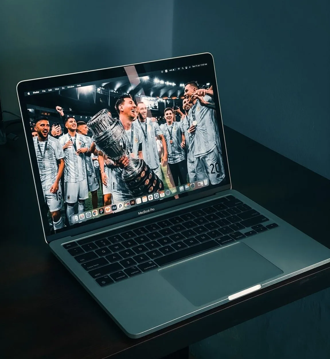 A laptop showing Messi