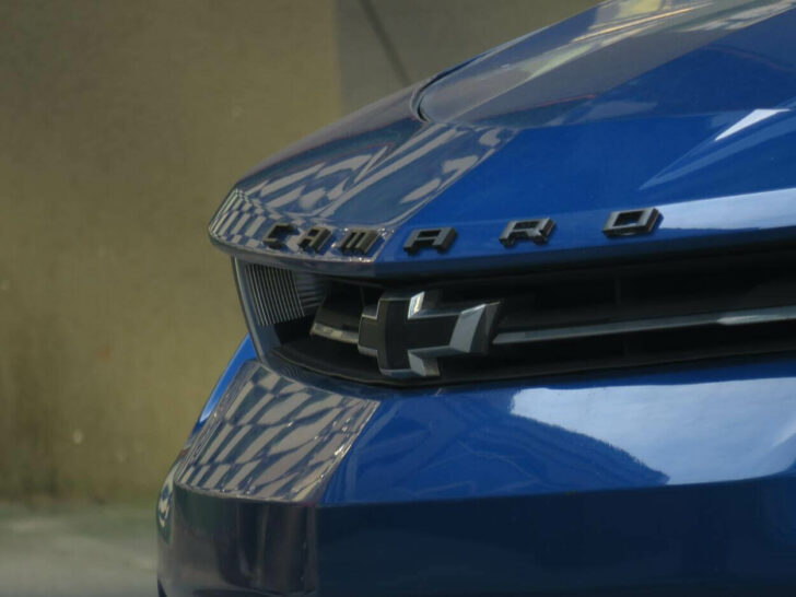 The Camaro logo on the car