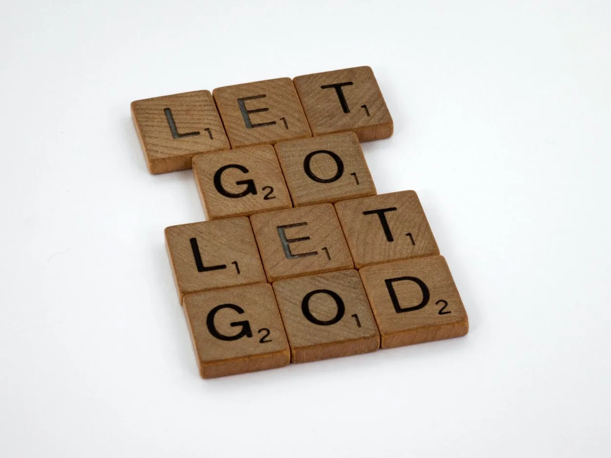 blocks that spell "Let go, Let God"