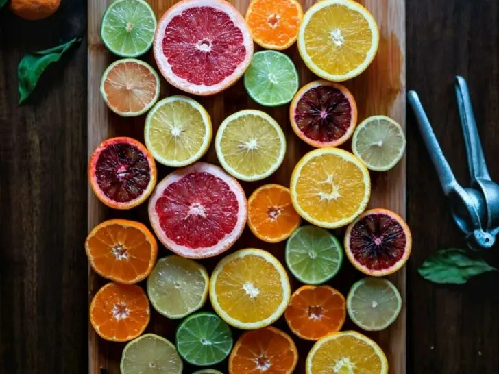 An image showing colorful lemons on a table.