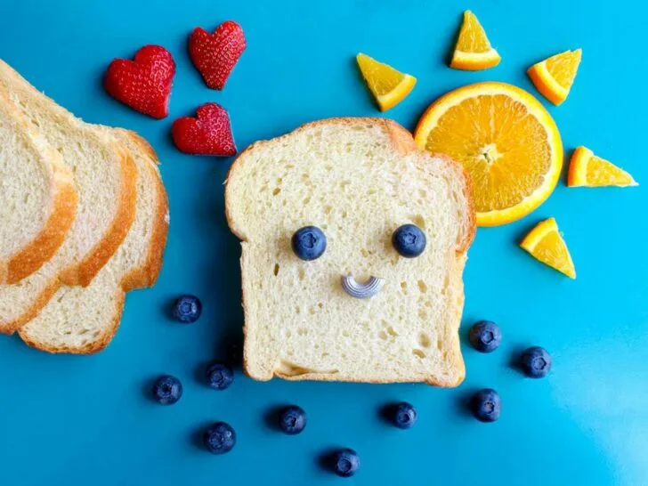 An image of a bread slice with fruits.