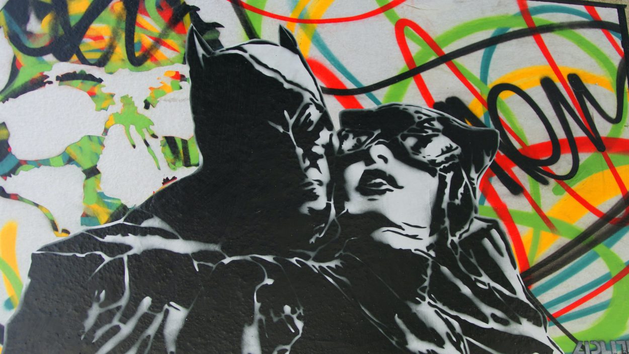 A retro drawing of Batman and Batwoman