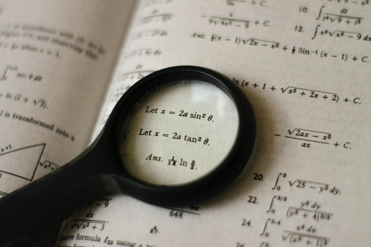 a small magnifying glass on a book