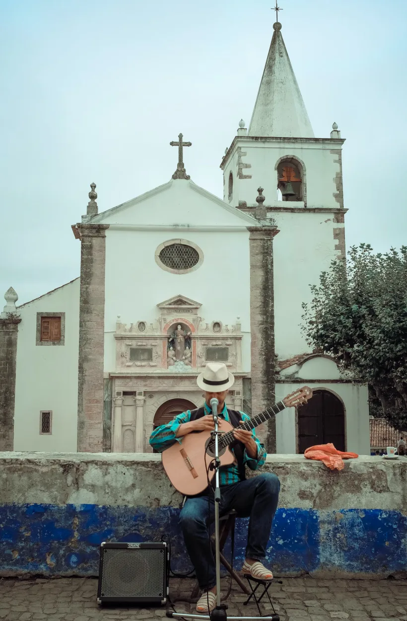 A man singing songs about his beautiful city. A City on a hill - Coimbra, Portugal