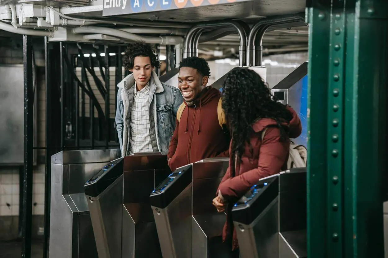 a group of friends at a subway station