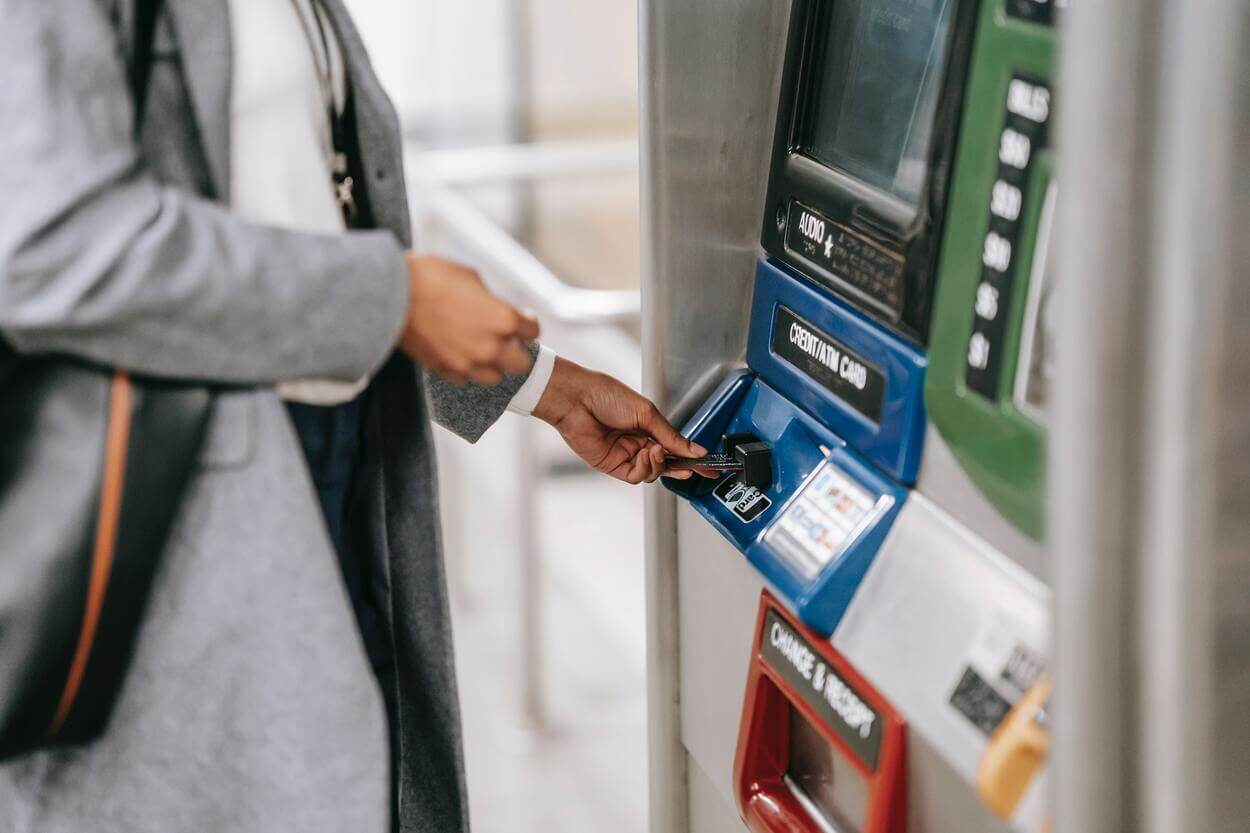 a person using and ATM