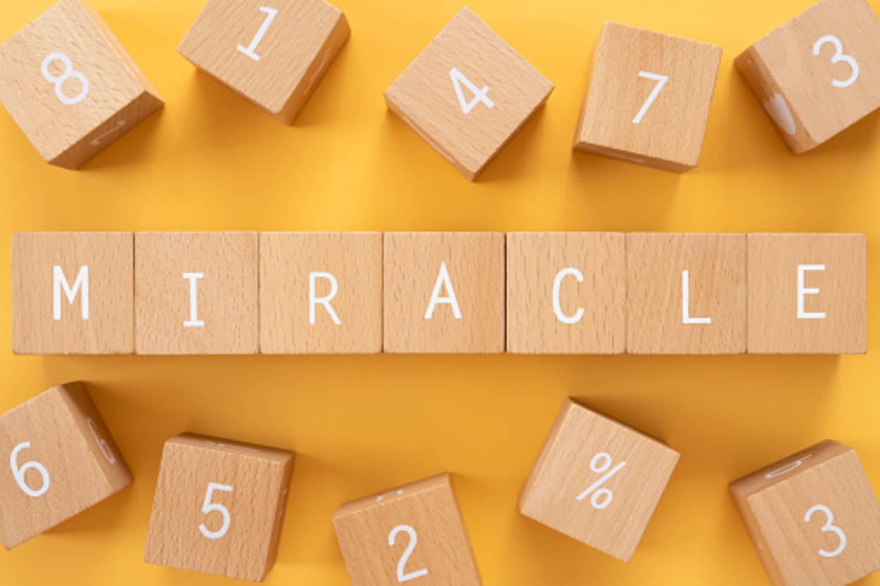 Miracle written with wooden blocks.