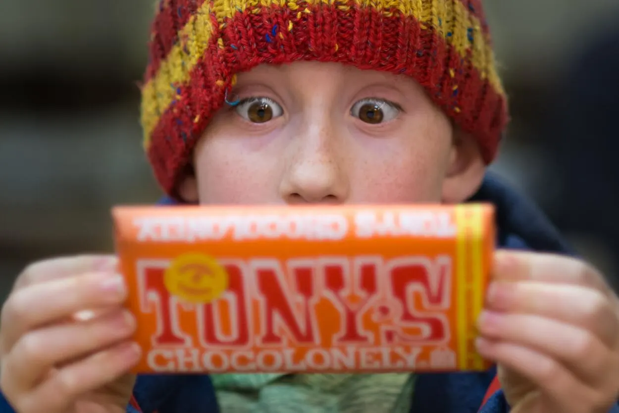 An image showing a boy looking at the chocolate