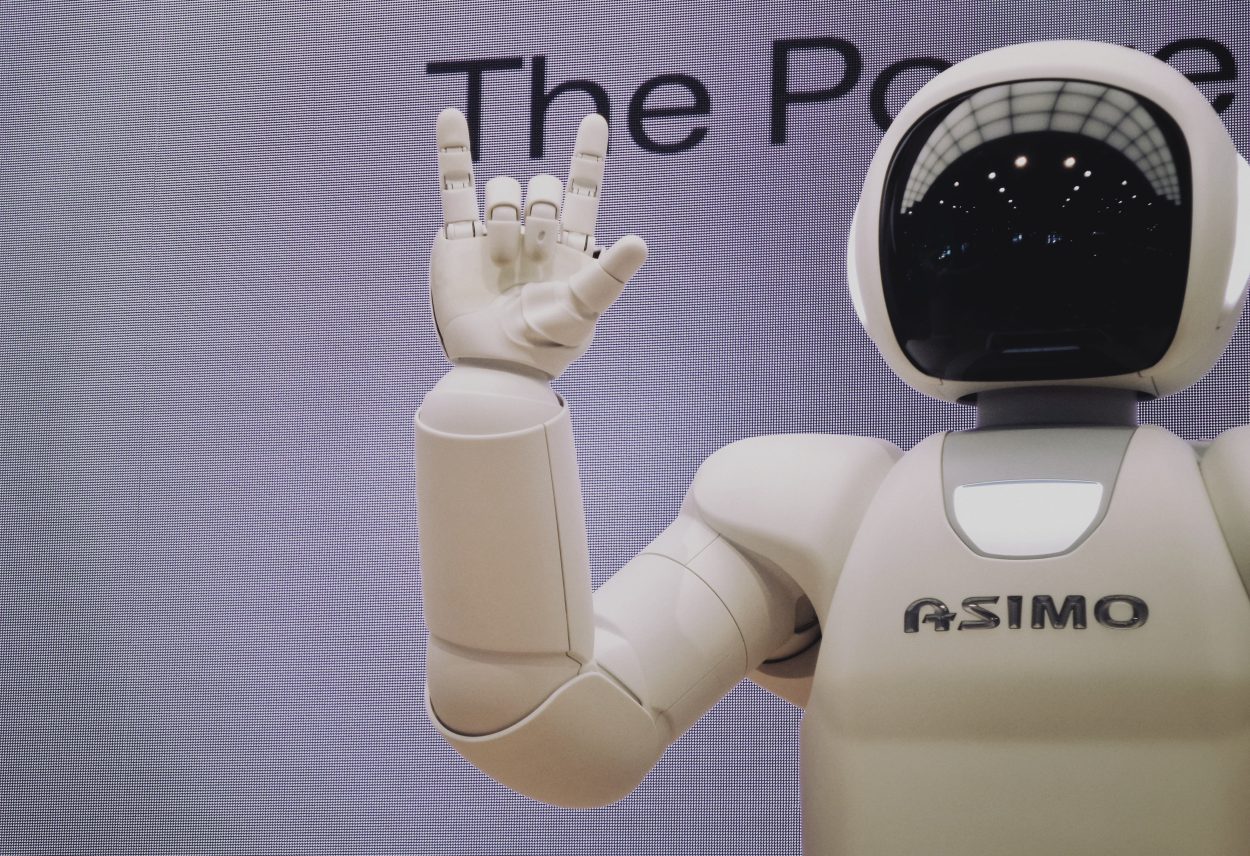 a robot doing a hand sign