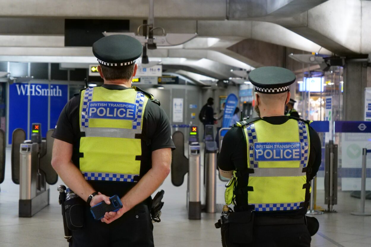 two police officers in a subway