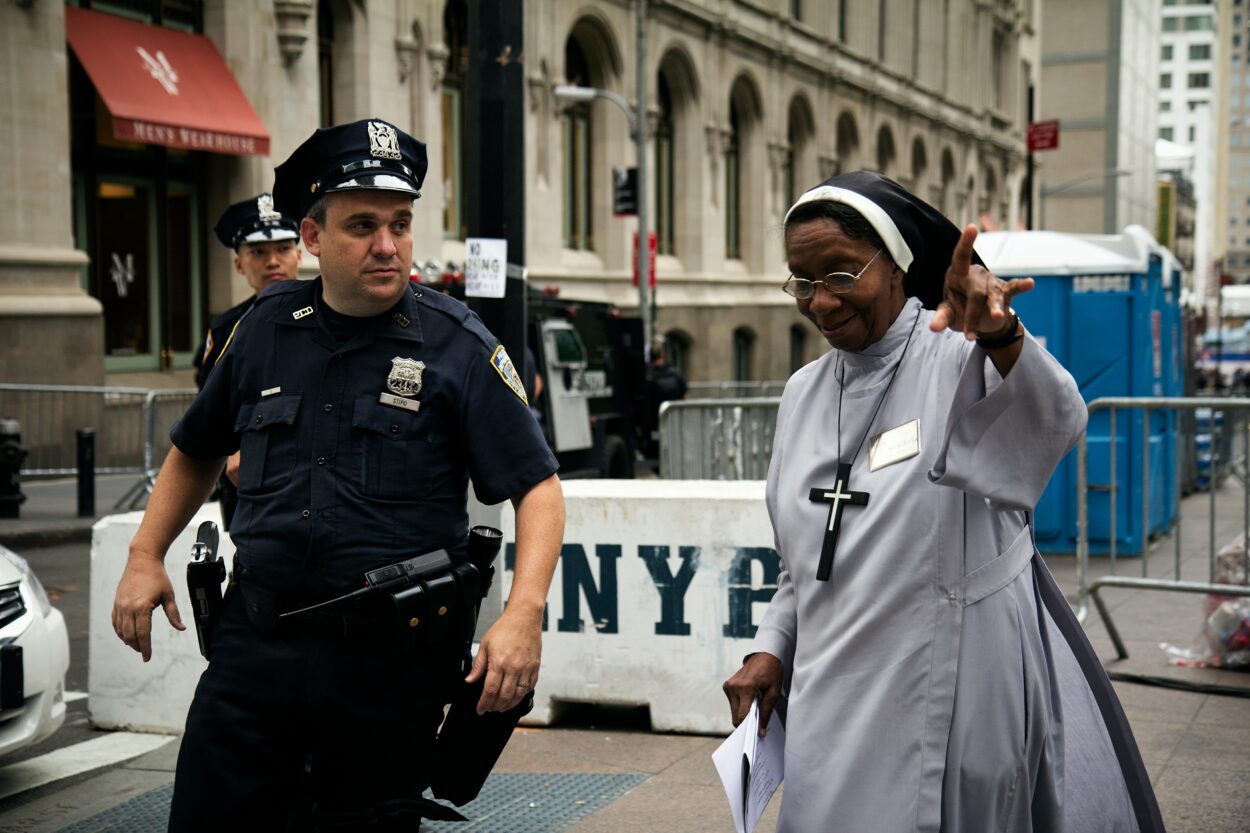 a police officer and a nun