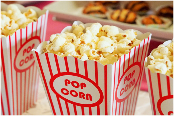 Eat popcorn while watching movies