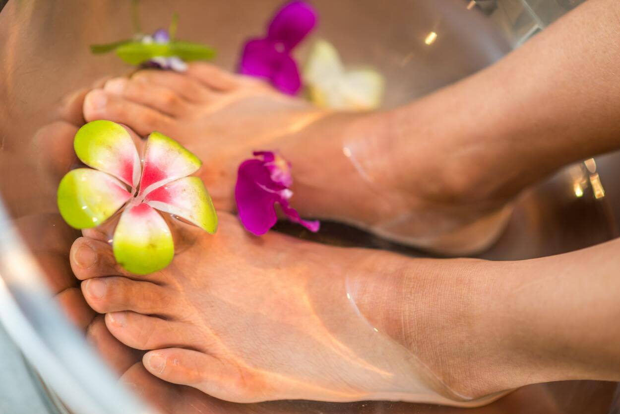 An image showing feet soaked in a tub.