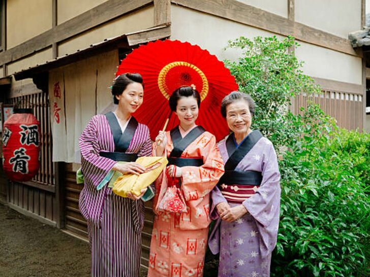 Two young and one elderly Japanese women wearing kimonos and yukatas