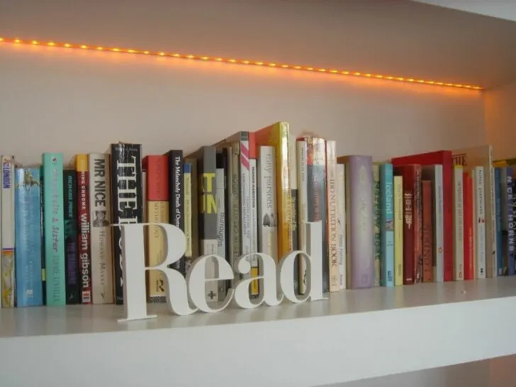 Image of books on a shelf with a 