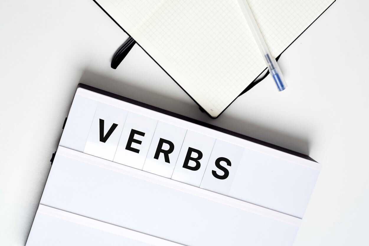 Image of page showing the word "verb."