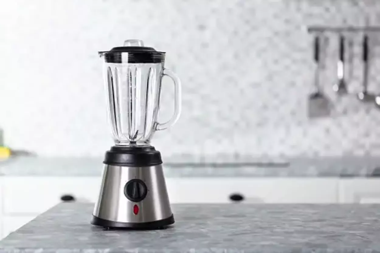 A blender placed on kitchen top.