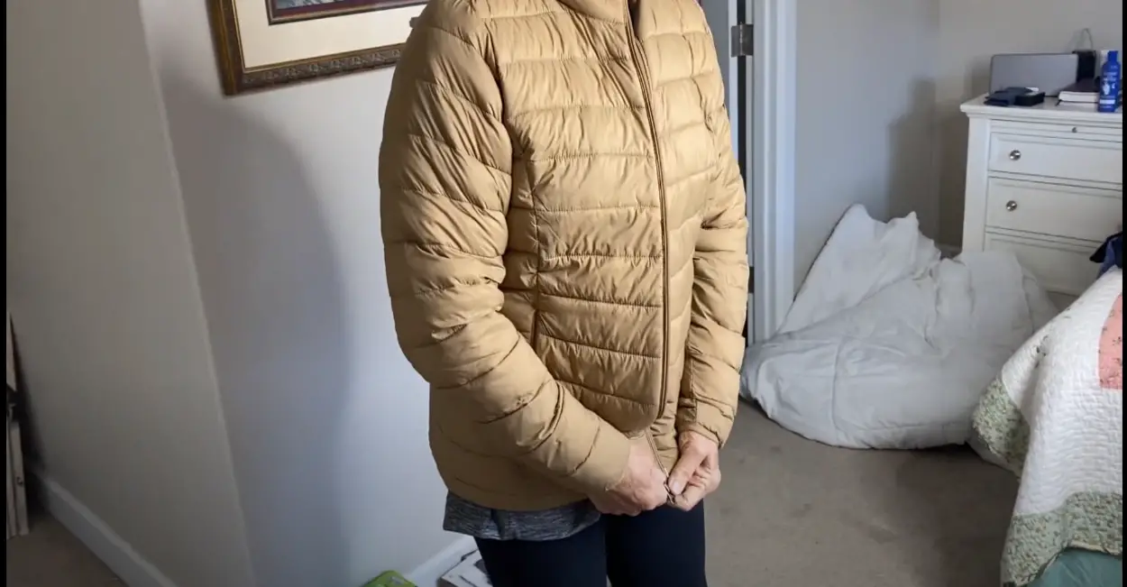 Woman trying amazon essential jacket