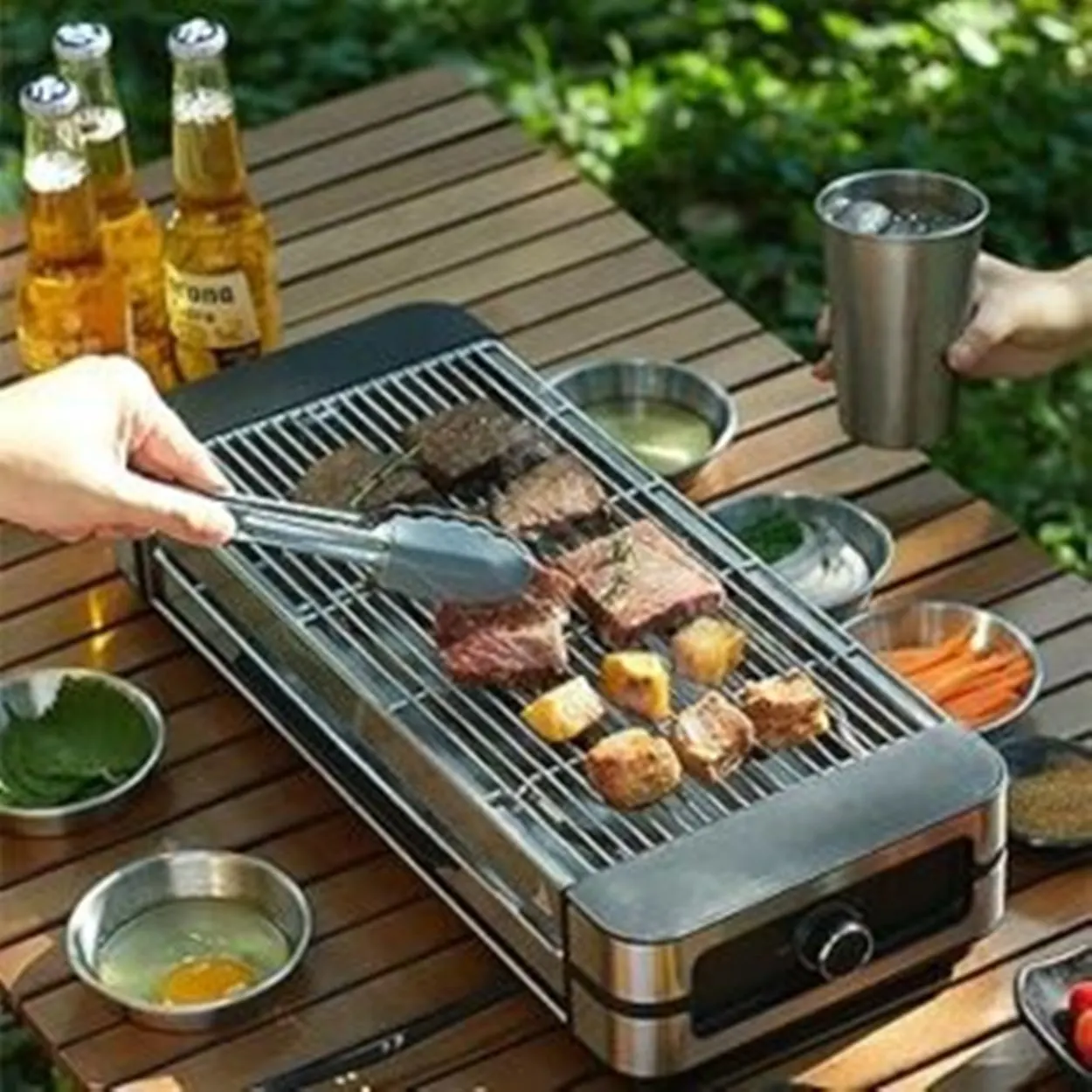 High-power electric grill being used to cook food